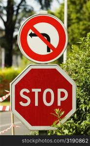 Close-up of stop signboards at the roadside, Le Mans, Sarthe, Pays-de-la-Loire, France