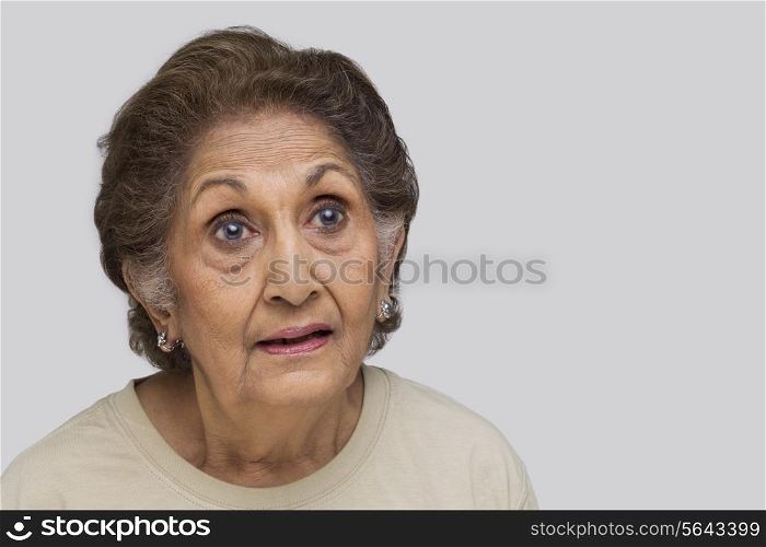 Close-up of surprised senior woman