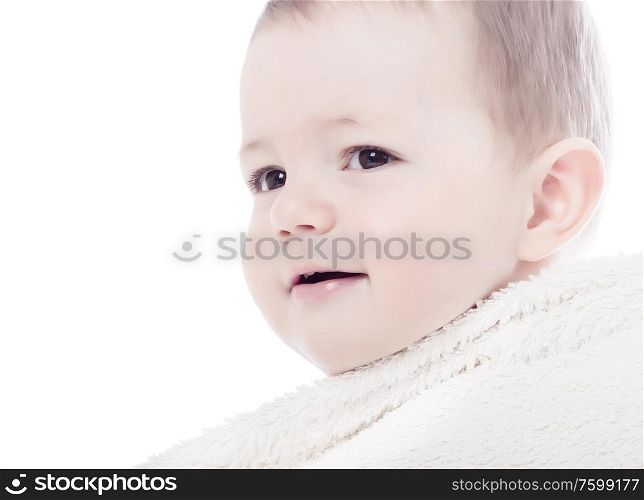 Close-up of sweet little baby smiling, on the whitebackground