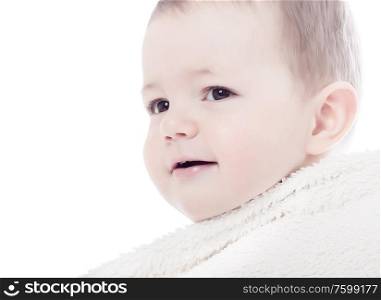 Close-up of sweet little baby smiling, on the whitebackground