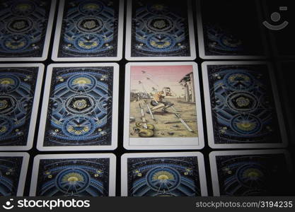 Close-up of tarot cards in a row