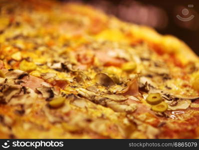 close up of tasty pizza with olives