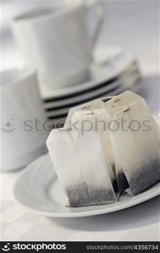 Close-up of teabags in a plate