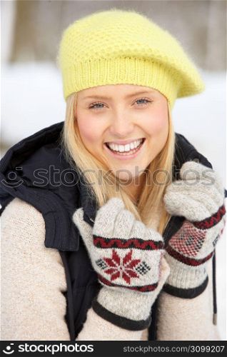 Close Up Of Teenage Girl In Snowy Landscape