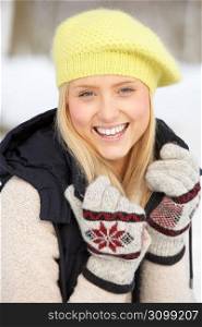 Close Up Of Teenage Girl In Snowy Landscape
