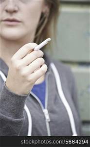 Close Up Of Teenage Girl Smoking Cigarette
