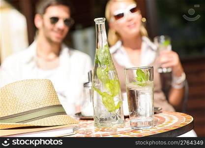 Close-up of terrace italian style refreshment table elegant romantic couple