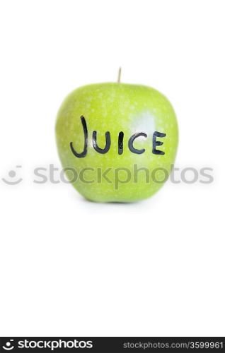 Close-up of text on a granny smith apple over white background