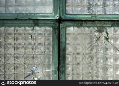 Close-up of the broken glass of a window