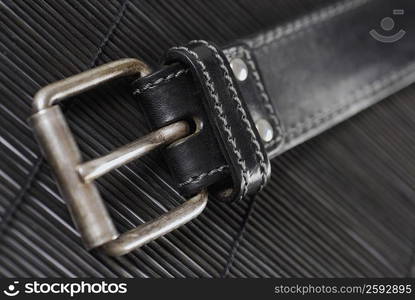 Close-up of the buckle of a belt