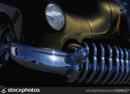 Close-up of the headlight of a car