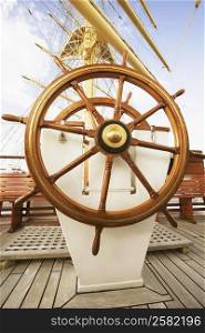 Close-up of the helm of a sailing ship