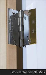 Close-up of the hinge on a door