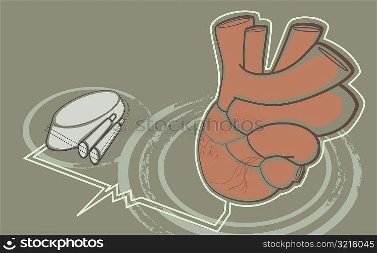 Close-up of the human heart with a medical tray and two syringe