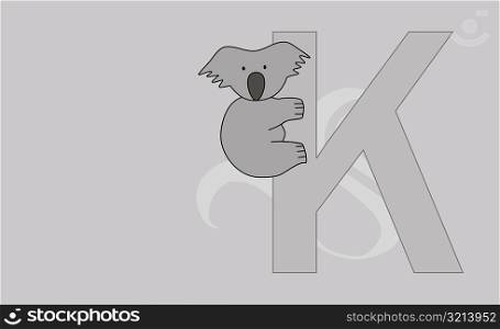 Close-up of the letter K with a koala