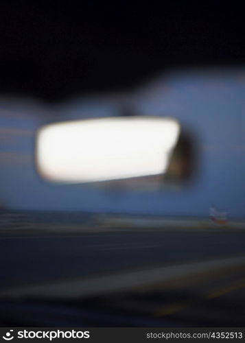 Close-up of the rear-view mirror of a car
