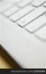 Close-up of the shift key on a laptop