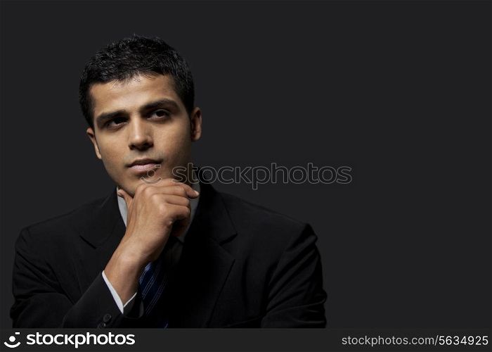Close-up of thoughtful businessman looking away