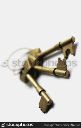 Close-up of three keys in a key ring