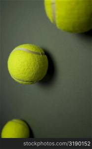 Close-up of three tennis balls