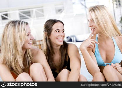 Close-up of three young women smiling