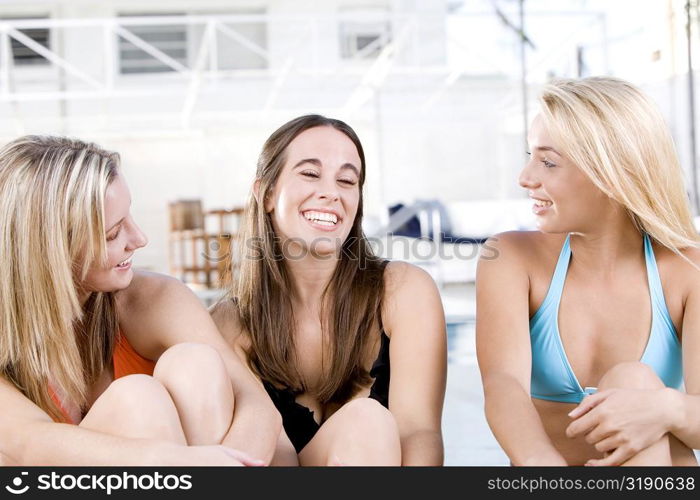 Close-up of three young women smiling