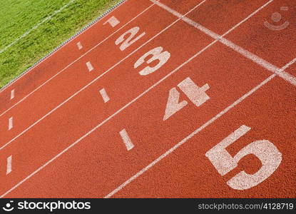 Close-up of track numbers on a running track