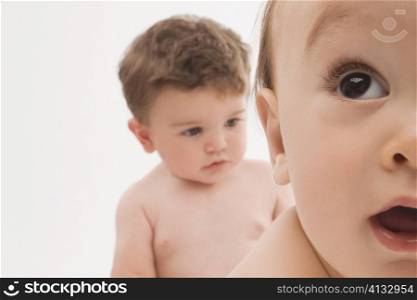 Close-up of two baby boys