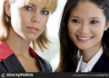 Close-up of two businesswomen