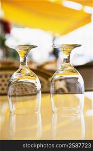 Close-up of two empty wine glasses on a table