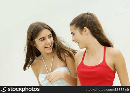 Close-up of two girls smiling