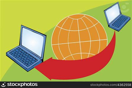 Close-up of two laptops with a globe