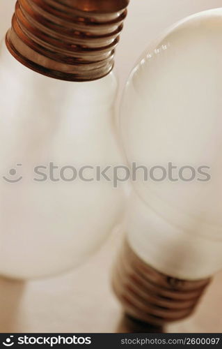 Close-up of two light bulbs