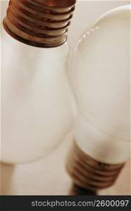 Close-up of two light bulbs