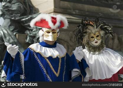 Close-up of two people in carnival costumes, Venice, Italy