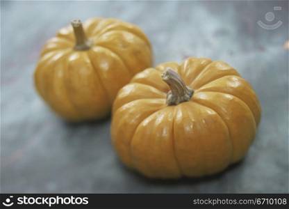 Close-up of two pumpkins