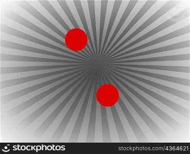 Close-up of two red circles on a patterned background
