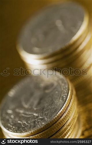 Close-up of two stacks of coins
