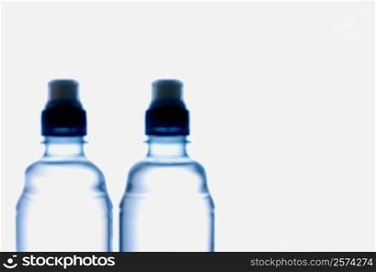 Close-up of two water bottles