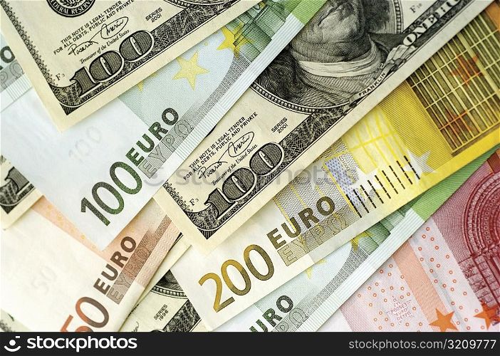 Close-up of US and Euro currency