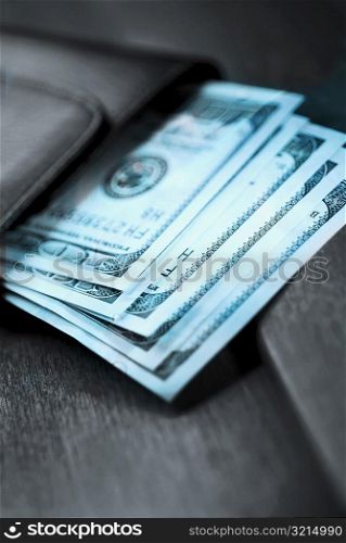 Close-up of US dollar banknotes in a wallet