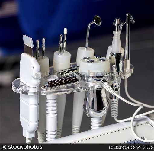 Close-up of various tools of medical cosmetology apparatus for liposuction and massage, used for the correction of the human body. Machine cosmetology.. A set of medical instruments for cosmetology apparatus for liposuction and massage, for the correction of the body. Machine cosmetology.