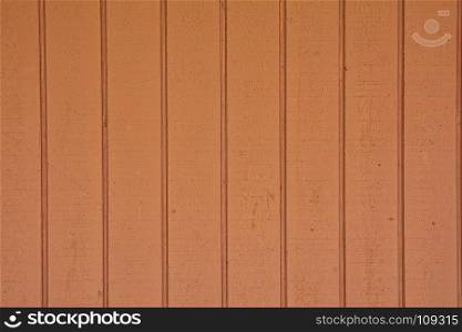 Close-up of vertical wooden planks of brown color