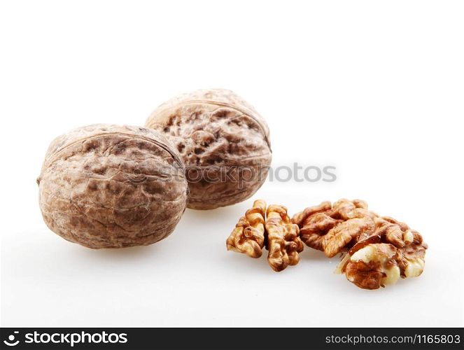 Close-Up Of Walnuts Isolated On White