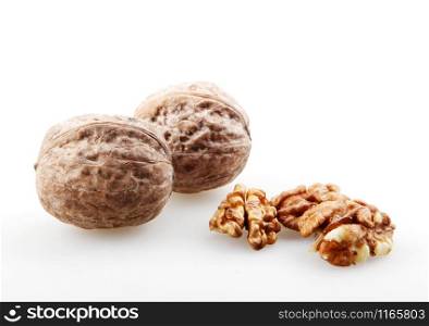 Close-Up Of Walnuts Isolated On White