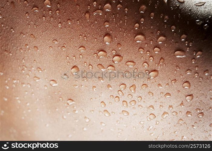 Close-up of water drops on a human body