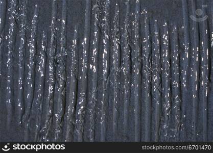 Close-up of water flowing down a wall
