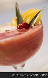 Close-up of watermelon juice in a stem glass