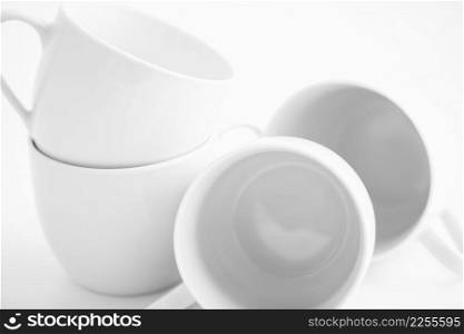 close up of white cups on white background, highkey