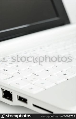 Close up of white mini laptop computer